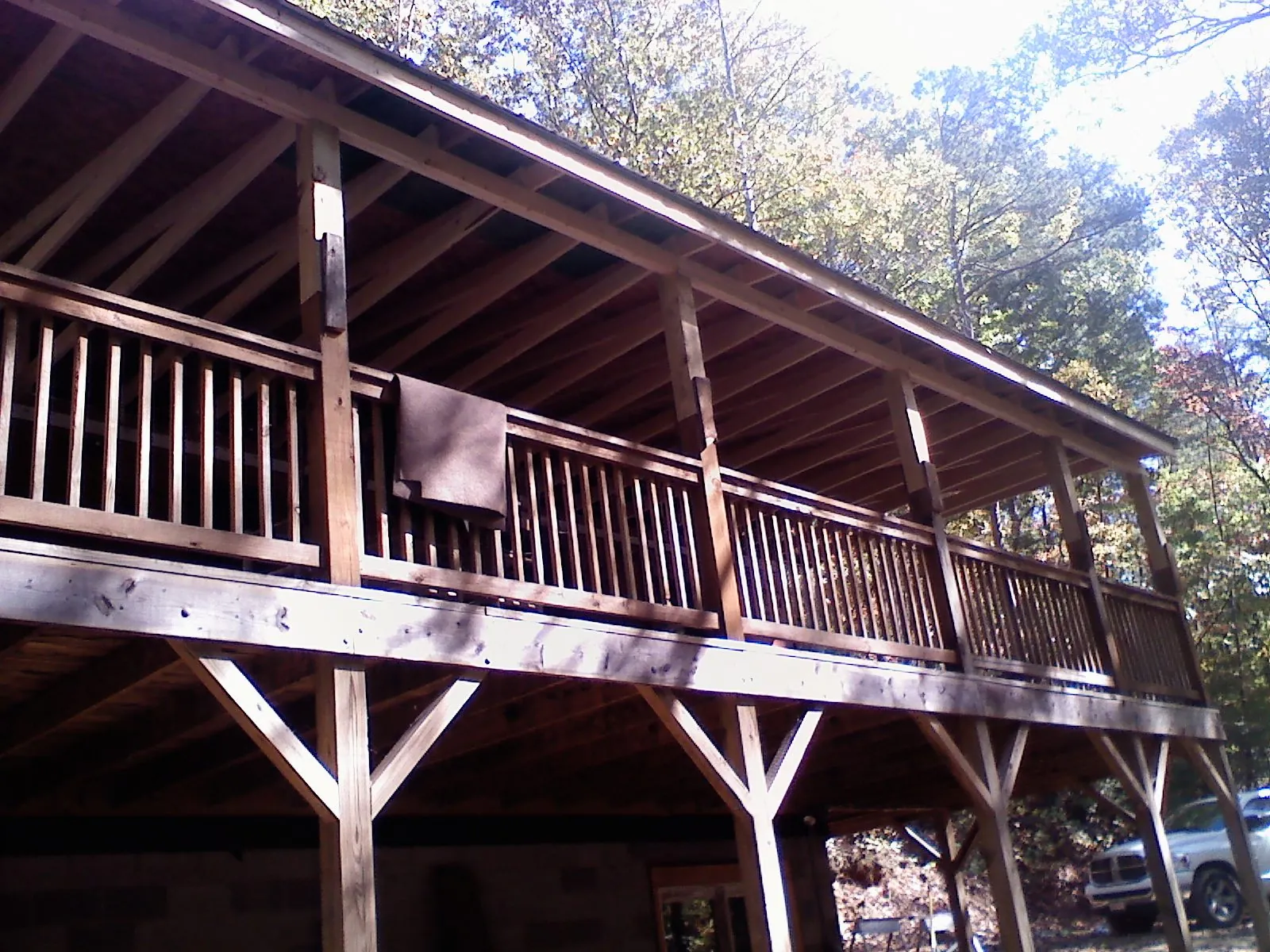Timber framing under a new elevated porch and deck — Roof Leak Repair in Temperanceville by Roofing Brothers